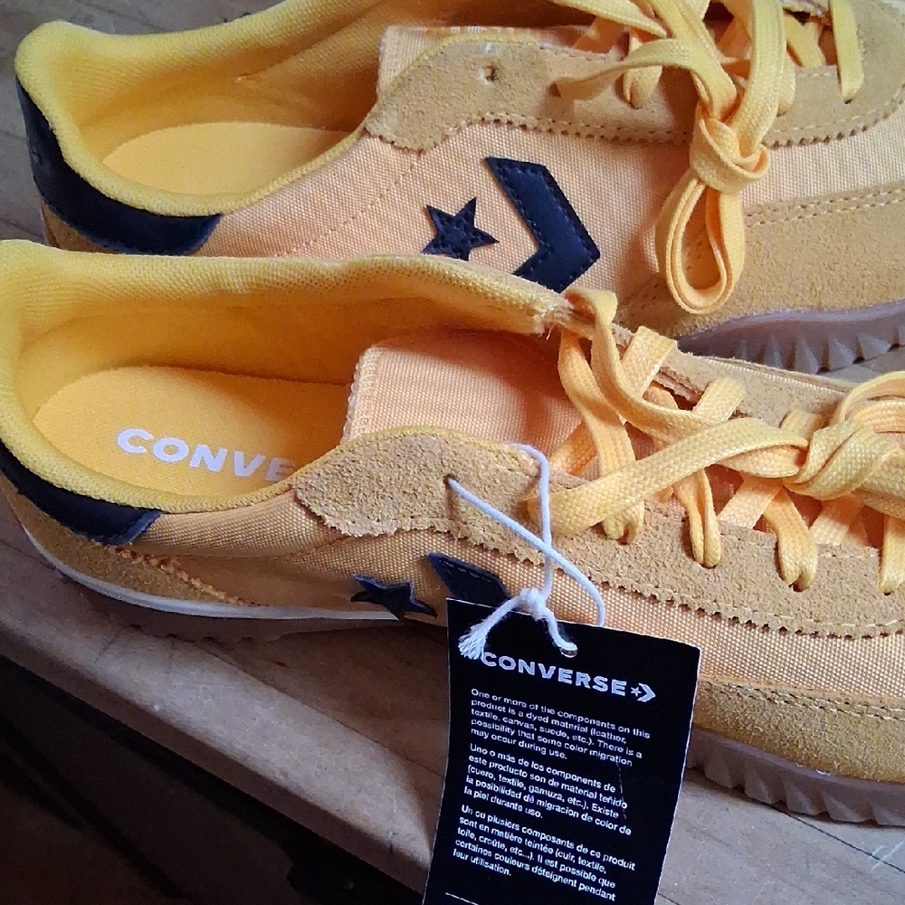 Converse Yellow and Black Low-Top Sneakers